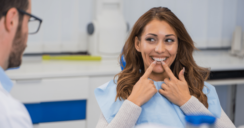 Woman discussing her healthy smile with a Fresno dentist during a dental consultation